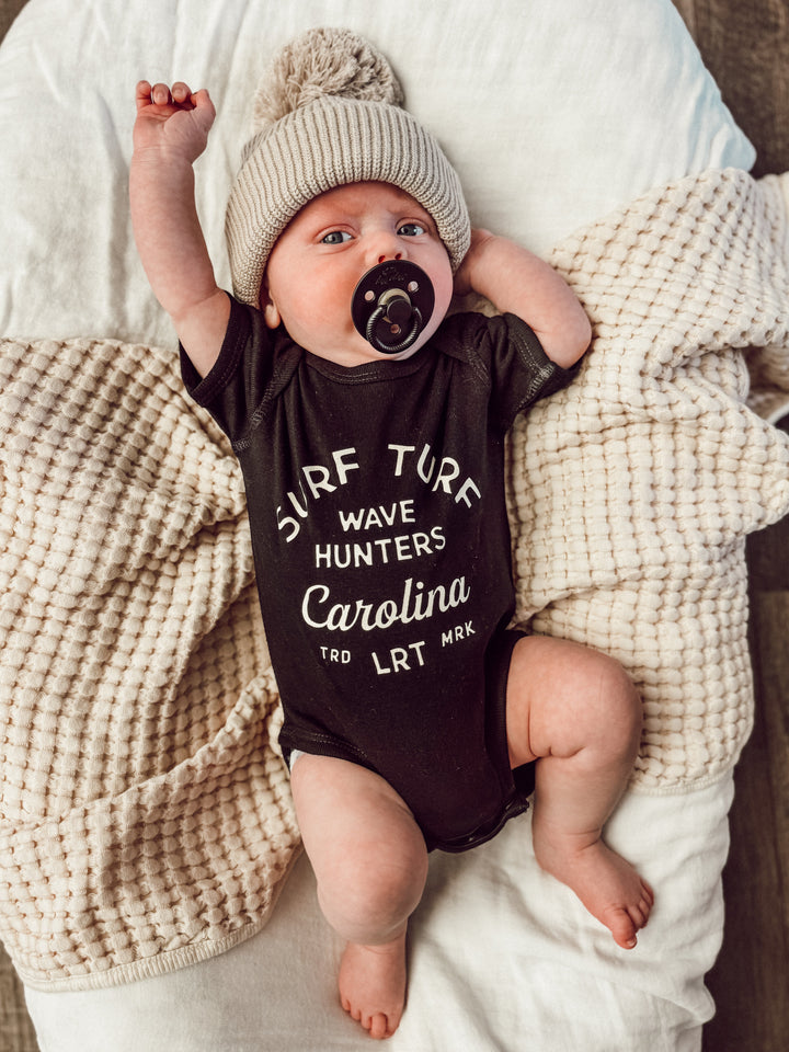 THE WAVE HUNTER ONESIE - BLACK