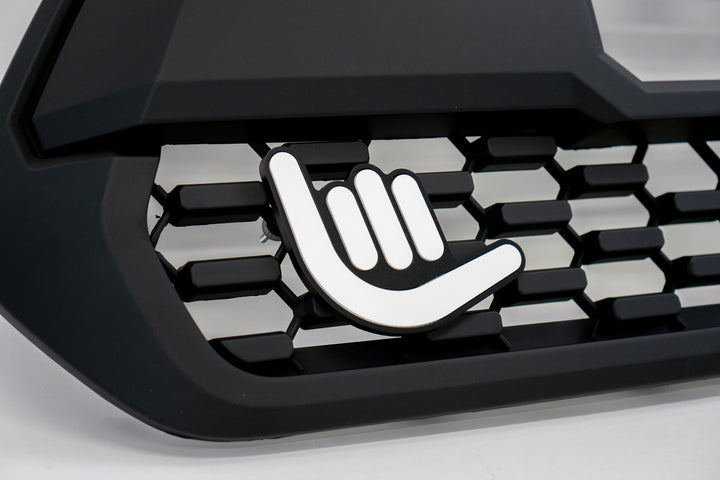 Shaka Grille Badge